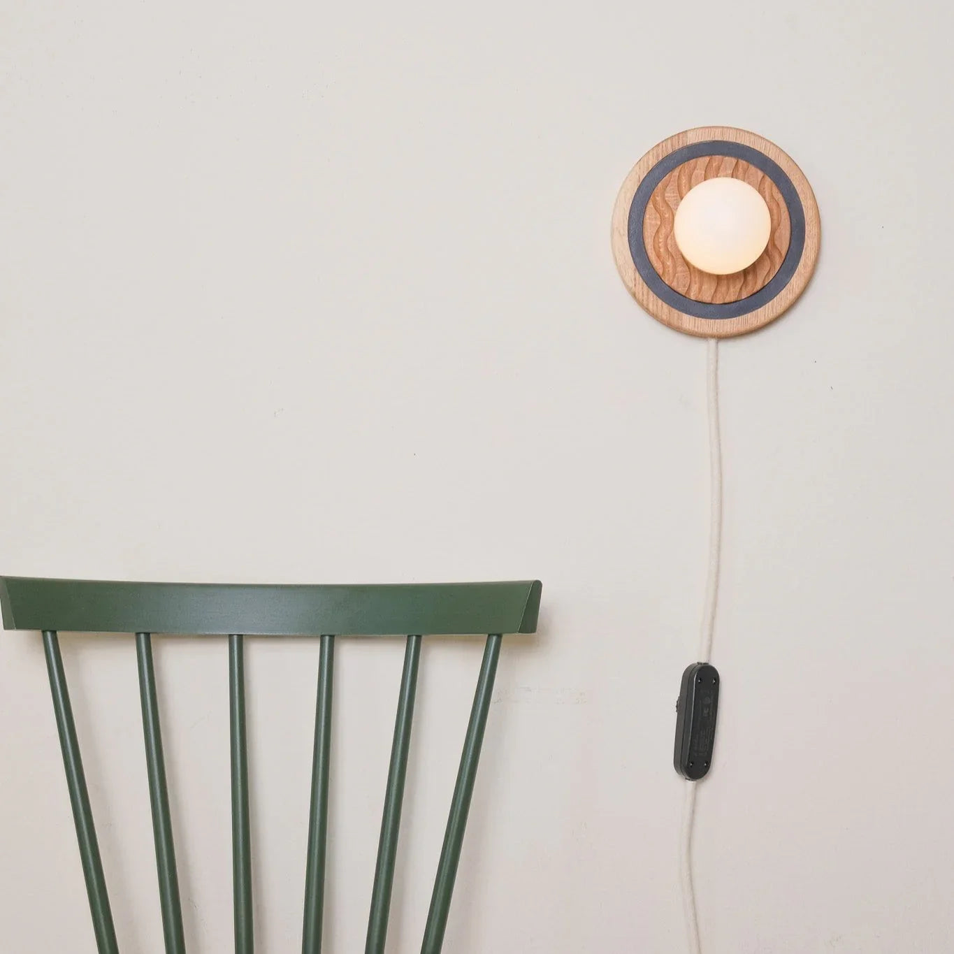 Eddy wall sconce