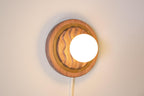 Eddy wall sconce