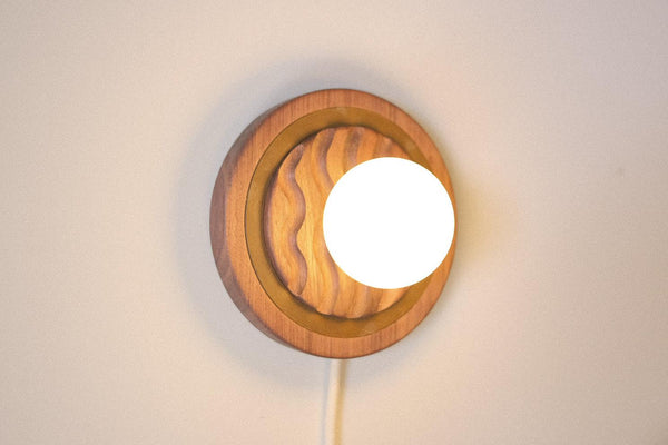 Eddy plug in wall sconce