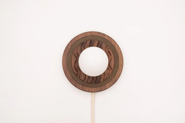 Eddy plug in wall sconce