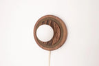 Eddy wall sconce