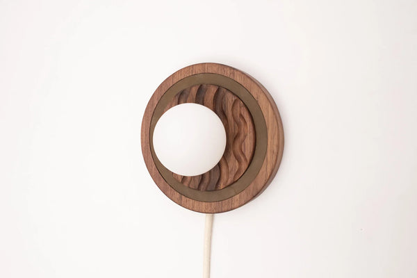 Eddy plug in wall sconce