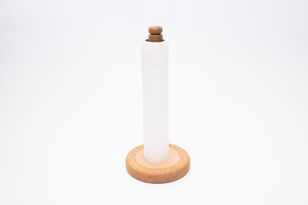 Wood paper towel holder on kitchen counter in modern kitchen