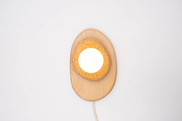 Wood and cork wall light in Japandi minimalist bedroom