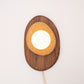 Pebble plug in wall sconce