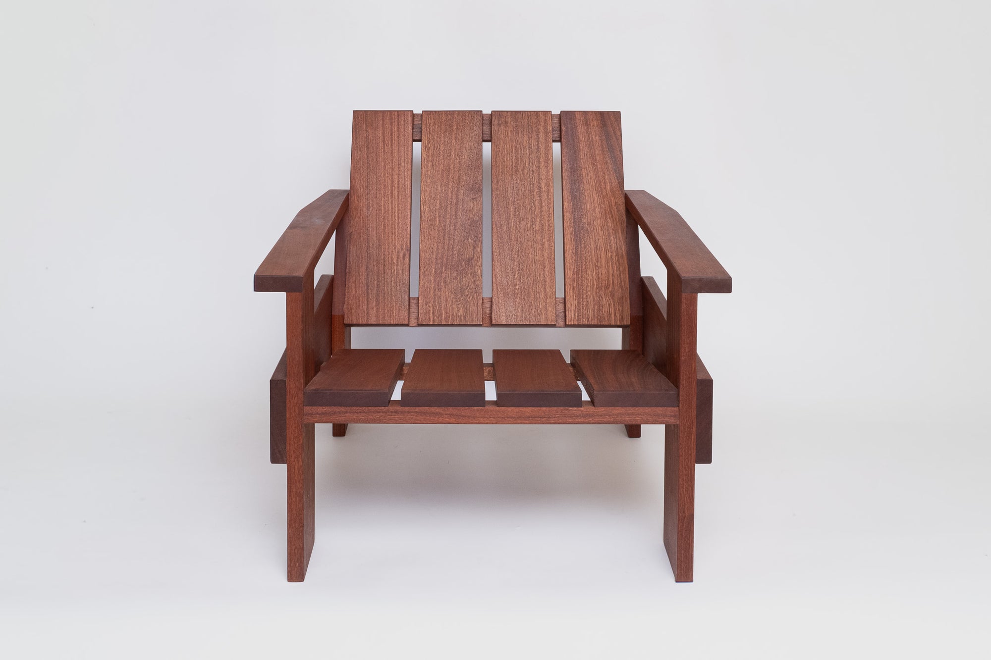 Facet outdoor chair front view showing sculptural geometric form