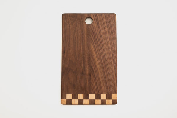 Checkered tail cutting board in maple with checkered hardwood inlay by Koppa Wood Design