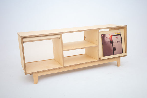Record console pull-out shelf displaying vinyl record