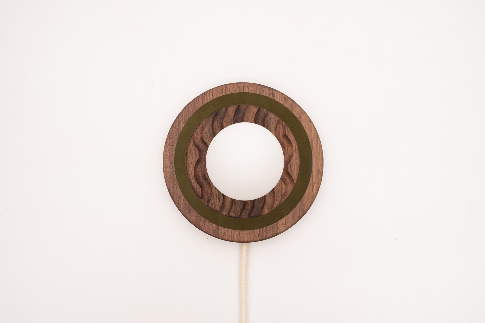 Eddy wall sconce