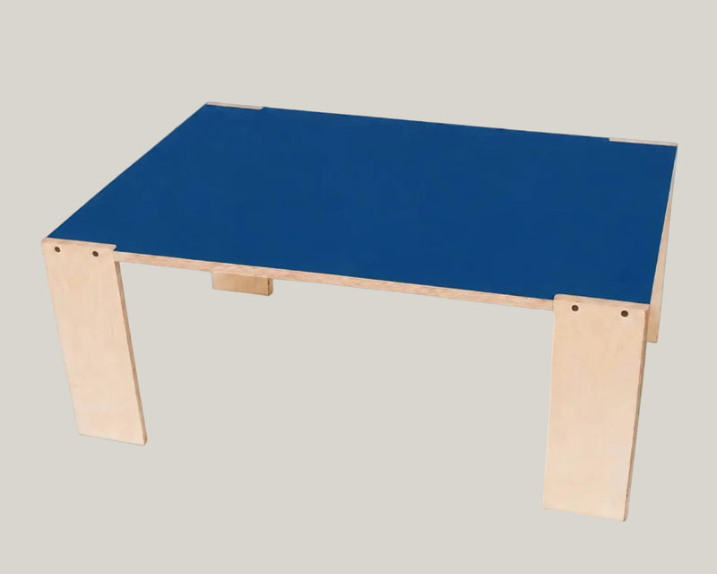 Table with a blue top and wooden legs on a white background

