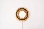 Eddy wall sconce
