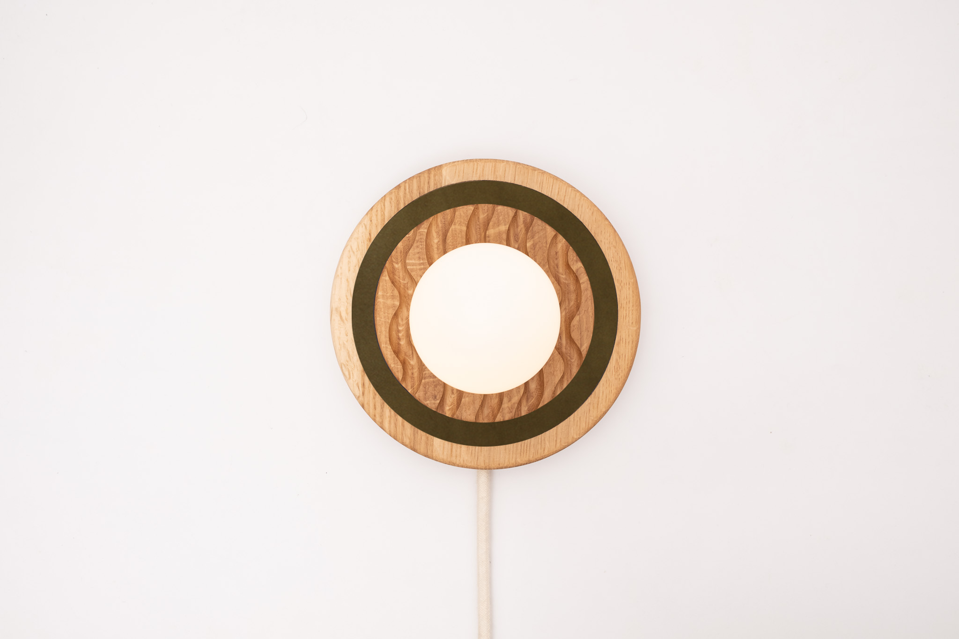 Eddy wall sconce